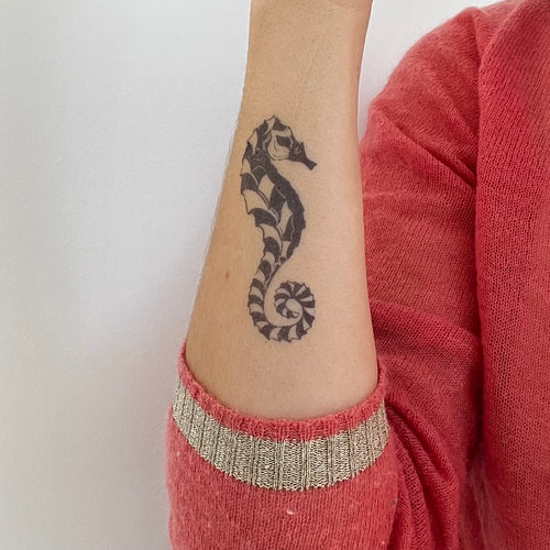 Tatuaggio con cavalluccio marino